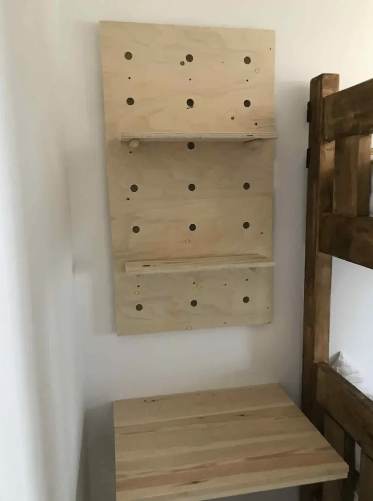 Custom timber pegboard, shelving and work surface